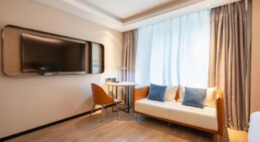 Bed in Echarm Hotel Guangzhou South Railway Station