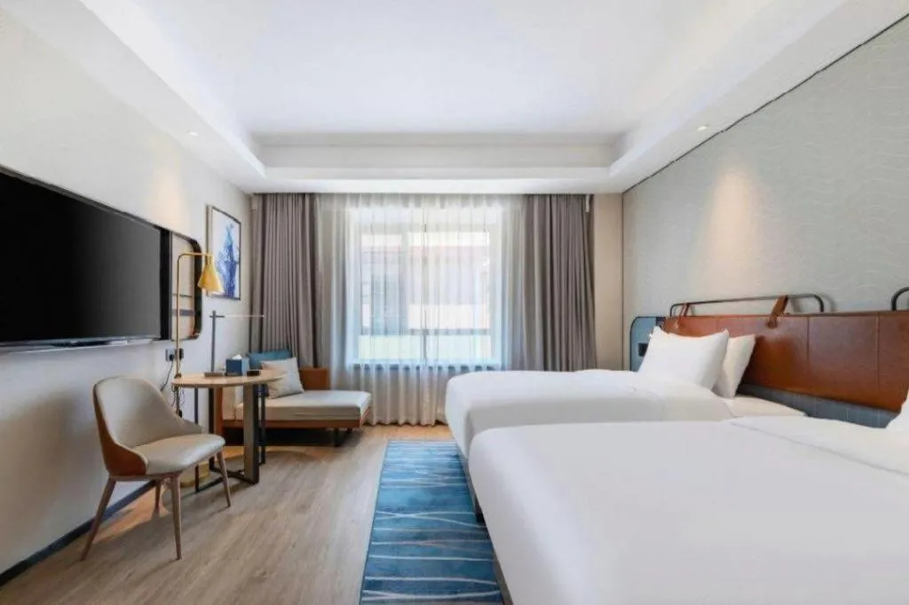 Bed in Echarm Hotel Guangzhou South Railway Station