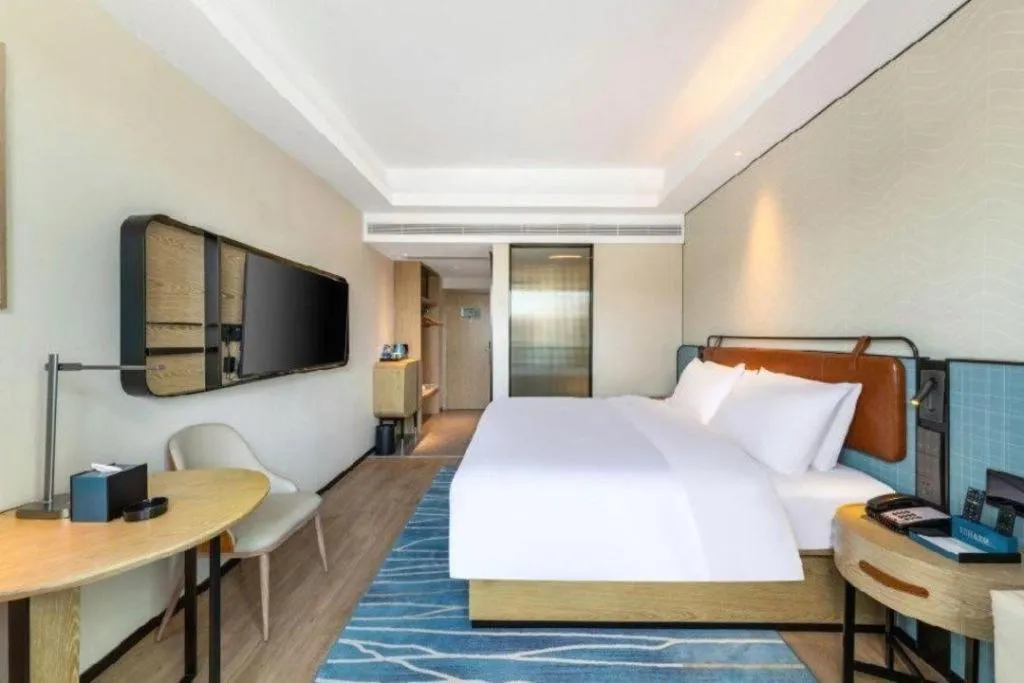 Bed in Echarm Hotel Guangzhou South Railway Station