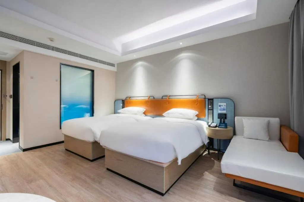 Bed in Echarm Hotel Guangzhou South Railway Station