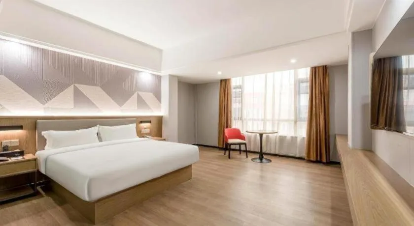 Bed in Borrman Hotel Zhanjiang Jinshawan Chikan Republic of China Style Street