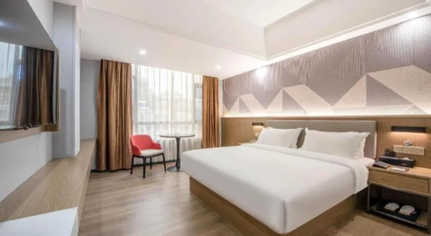 Bed in Borrman Hotel Zhanjiang Jinshawan Chikan Republic of China Style Street