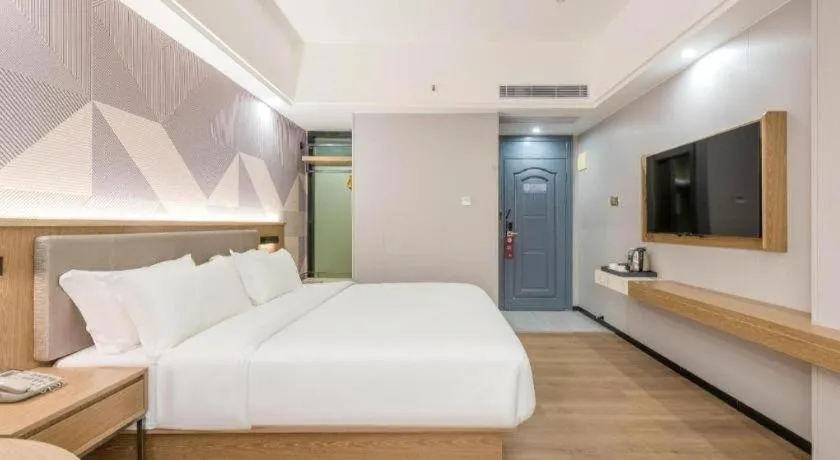 Bed in Borrman Hotel Zhanjiang Jinshawan Chikan Republic of China Style Street