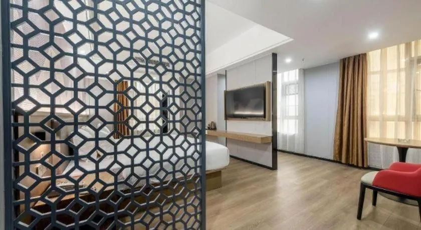 Bed in Borrman Hotel Zhanjiang Jinshawan Chikan Republic of China Style Street