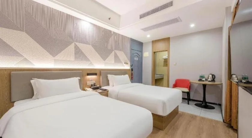 Bed in Borrman Hotel Zhanjiang Jinshawan Chikan Republic of China Style Street