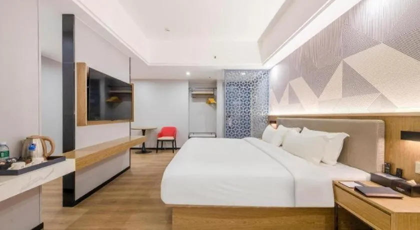 Bed in Borrman Hotel Zhanjiang Jinshawan Chikan Republic of China Style Street