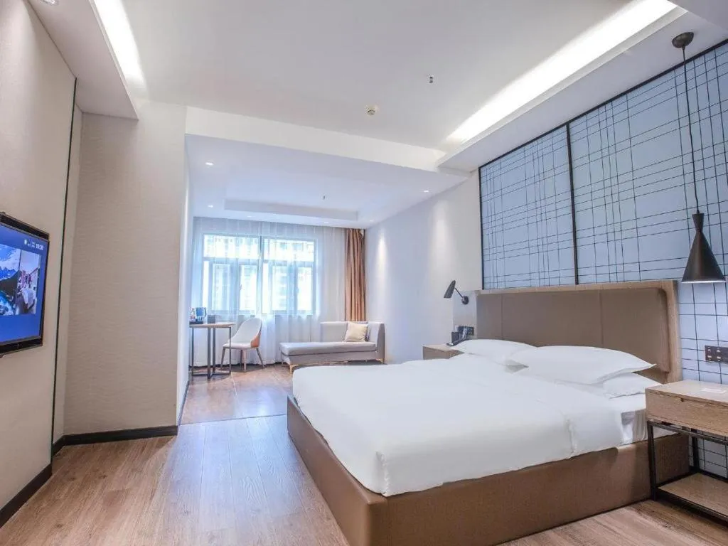 Bed in Echarm Hotel Changsha Yueliangdao Guanziling Metro Station