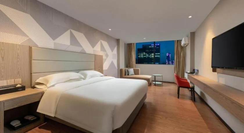 Bed in Borrman Hotel Zhongshan Lihe Plaza