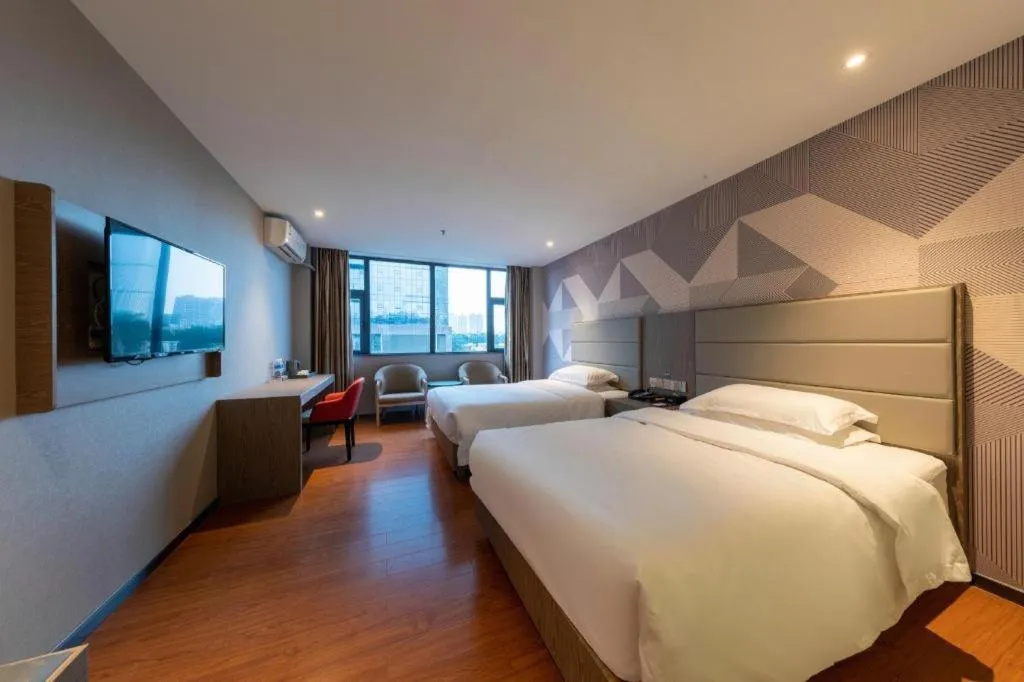 Bed in Borrman Hotel Zhongshan Lihe Plaza