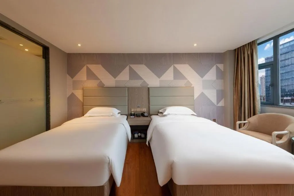 Bed in Borrman Hotel Zhongshan Lihe Plaza