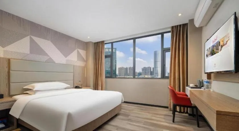 Bed in Borrman Hotel Zhongshan Lihe Plaza