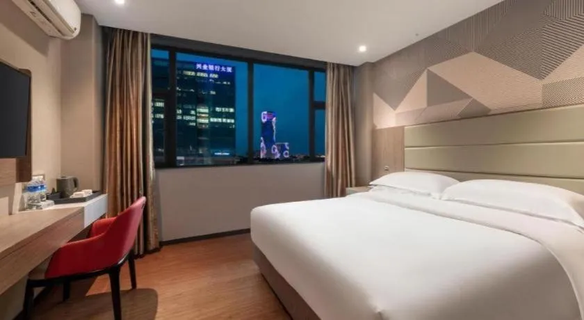 Bed in Borrman Hotel Zhongshan Lihe Plaza