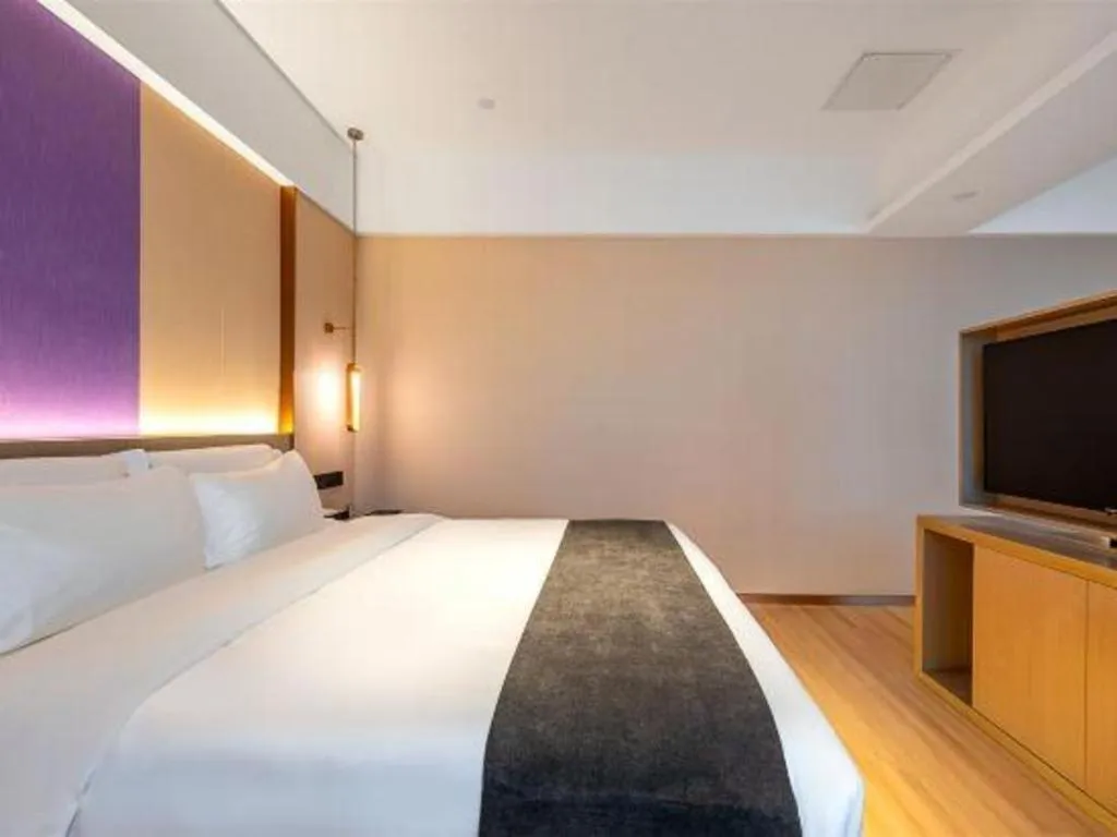 Bed in Borrman Hotel Zhongshan Lihe Plaza