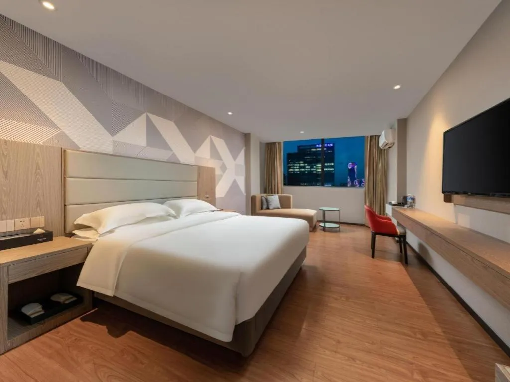 Bed in Borrman Hotel Zhongshan Lihe Plaza