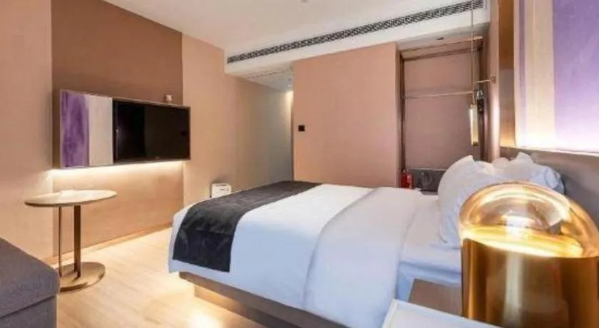 Bed in Borrman Hotel Zhongshan Lihe Plaza