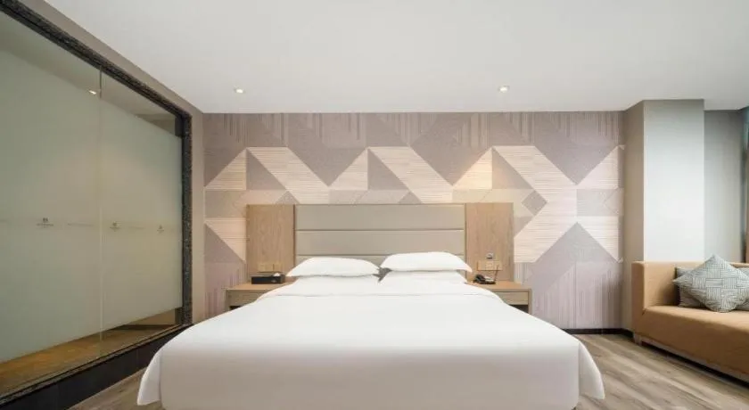 Bed in Borrman Hotel Zhongshan Lihe Plaza