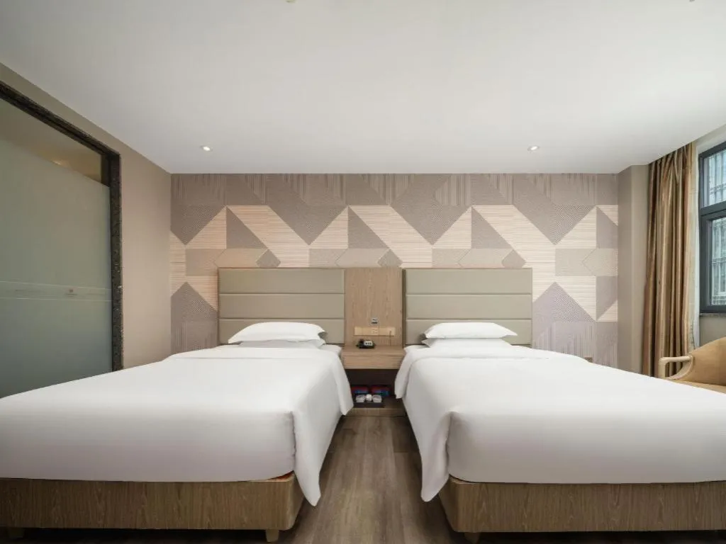 Bed in Borrman Hotel Zhongshan Lihe Plaza