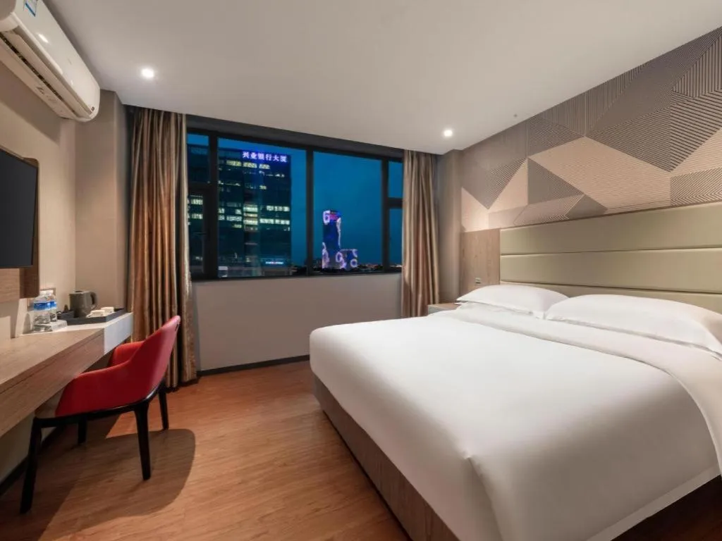 Bed in Borrman Hotel Zhongshan Lihe Plaza