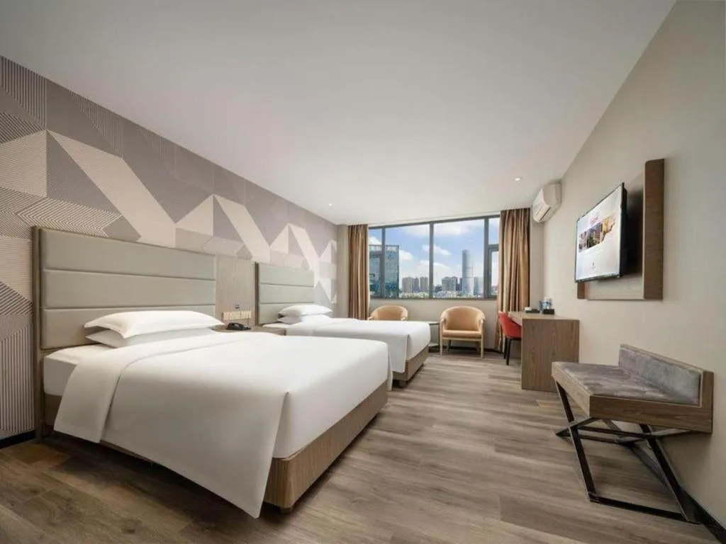 Bed in Borrman Hotel Zhongshan Lihe Plaza