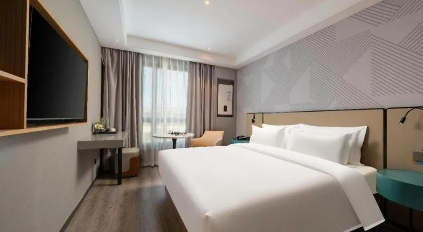 Bed in Borrman Hotel Beijing Guomao Jinsong Metro Station