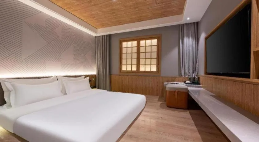 Bed in Borrman Hotel Beijing Guomao Jinsong Metro Station