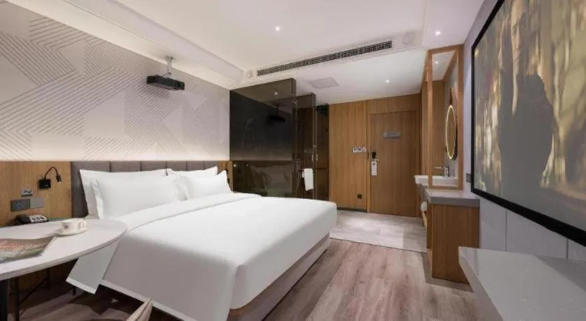 Bed in Borrman Hotel Beijing Guomao Jinsong Metro Station