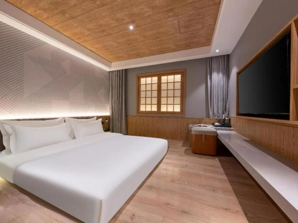 Bed in Borrman Hotel Beijing Guomao Jinsong Metro Station