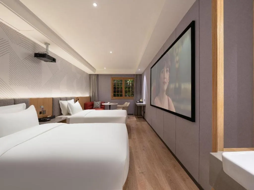 Bed in Borrman Hotel Beijing Guomao Jinsong Metro Station