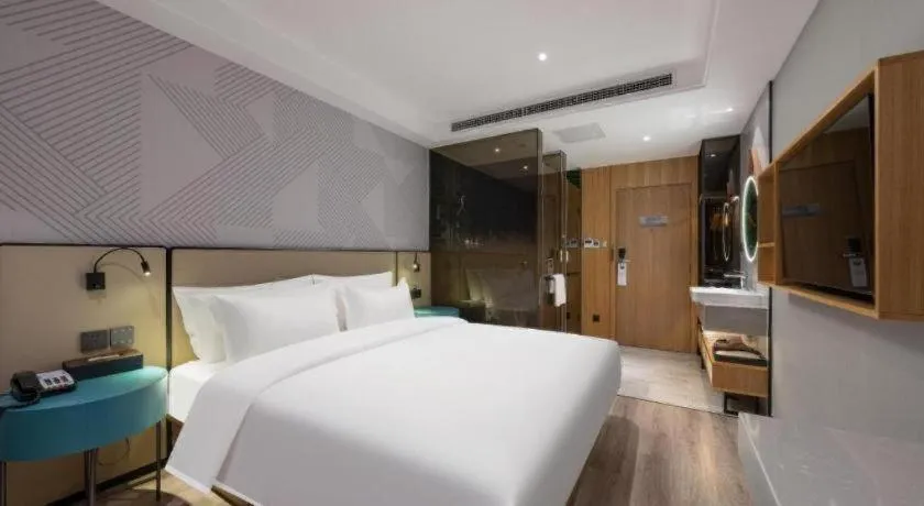 Bed in Borrman Hotel Beijing Guomao Jinsong Metro Station