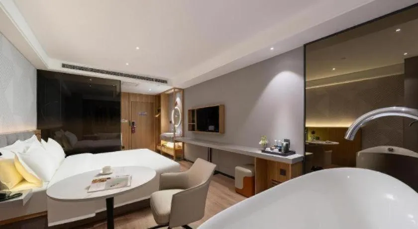 Bed in Borrman Hotel Beijing Guomao Jinsong Metro Station