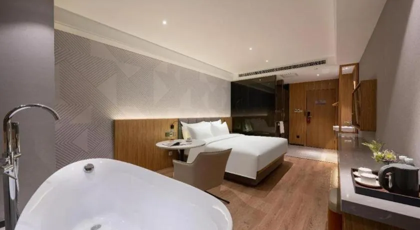 Bed in Borrman Hotel Beijing Guomao Jinsong Metro Station