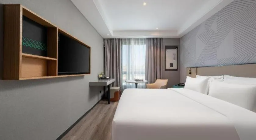 Bed in Borrman Hotel Beijing Guomao Jinsong Metro Station