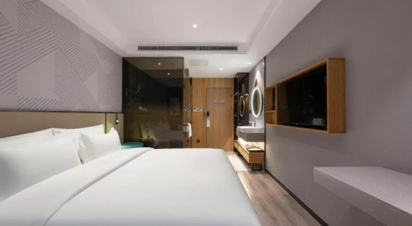 Bed in Borrman Hotel Beijing Guomao Jinsong Metro Station