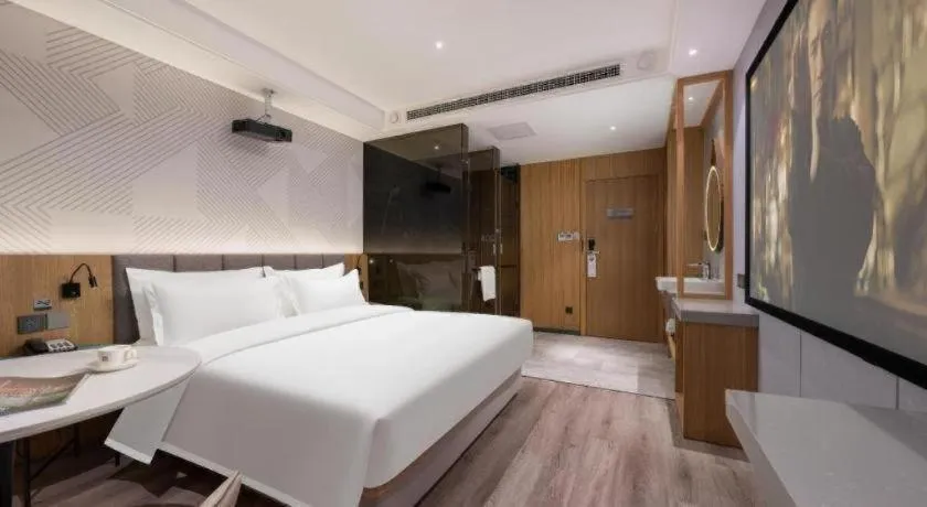 Bed in Borrman Hotel Beijing Guomao Jinsong Metro Station