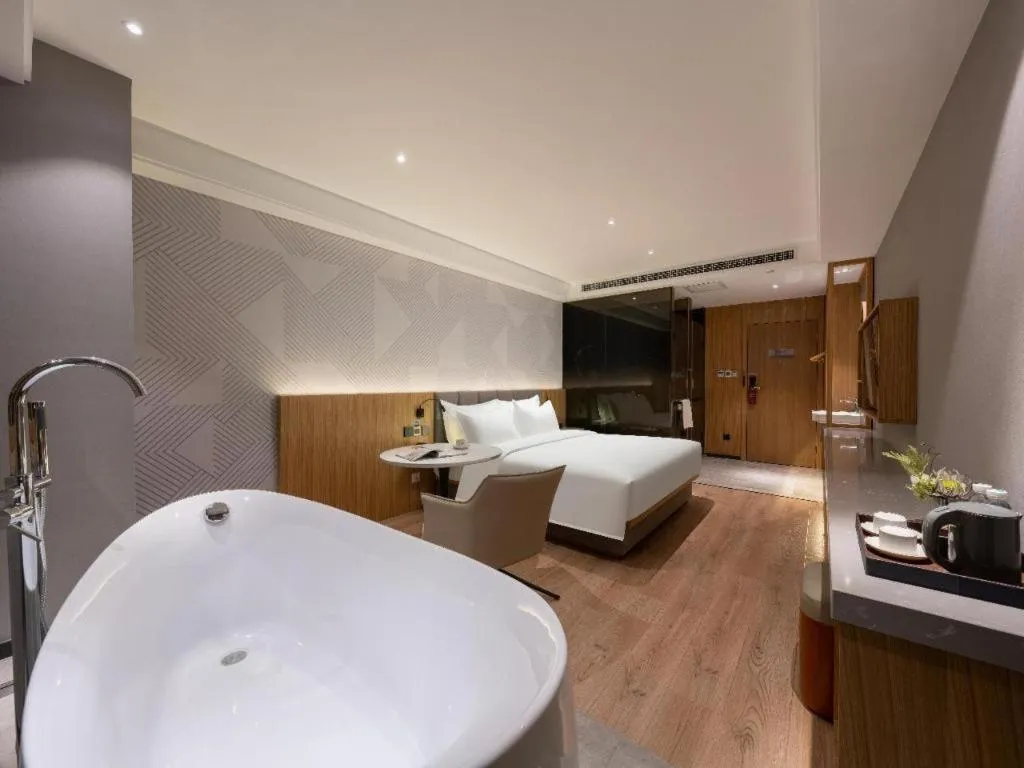 Bed in Borrman Hotel Beijing Guomao Jinsong Metro Station