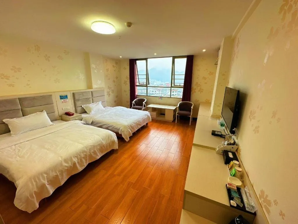 Bed in Borrman Hotel Lipu Central Plaza