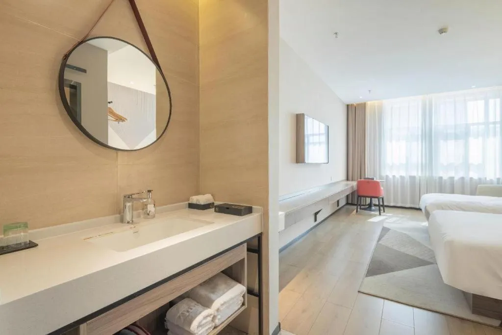 Bed in Borrman Hotel Korla Peacock River