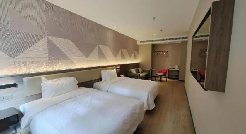 Bed in Borrman Hotel Korla Peacock River