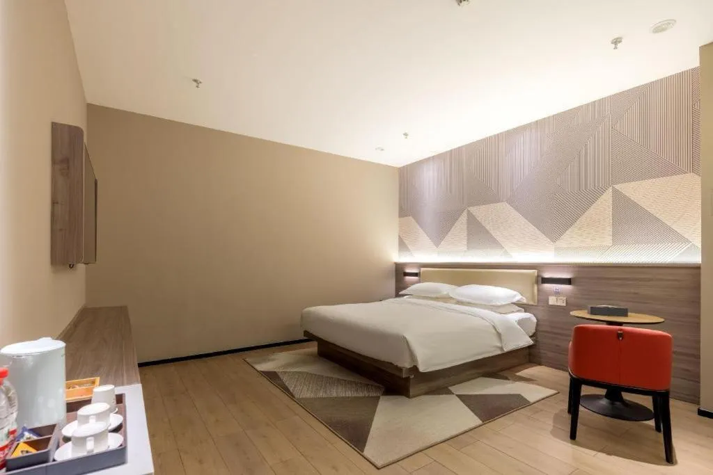 Bed in Borrman Hotel Korla Peacock River