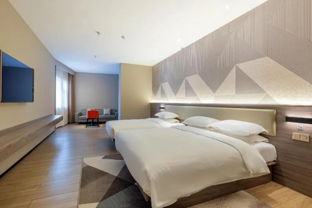 Bed in Borrman Hotel Korla Peacock River