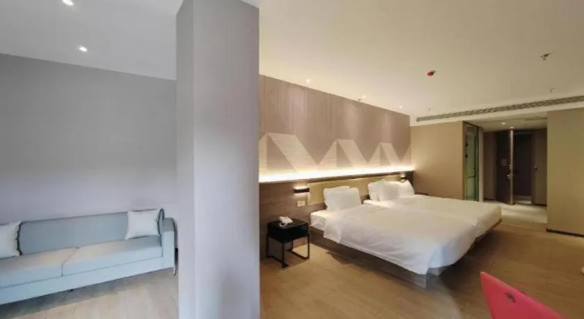 Bed in Borrman Hotel Korla Peacock River