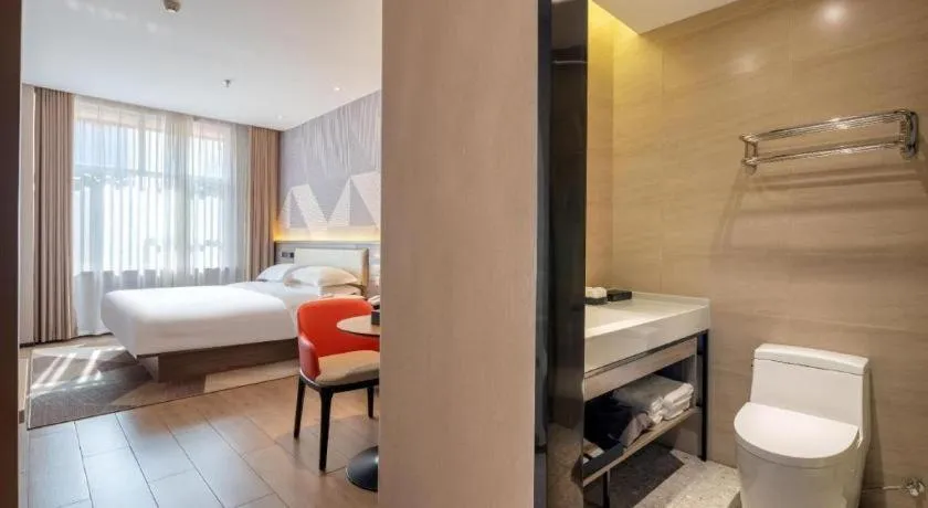 Bed in Borrman Hotel Korla Peacock River