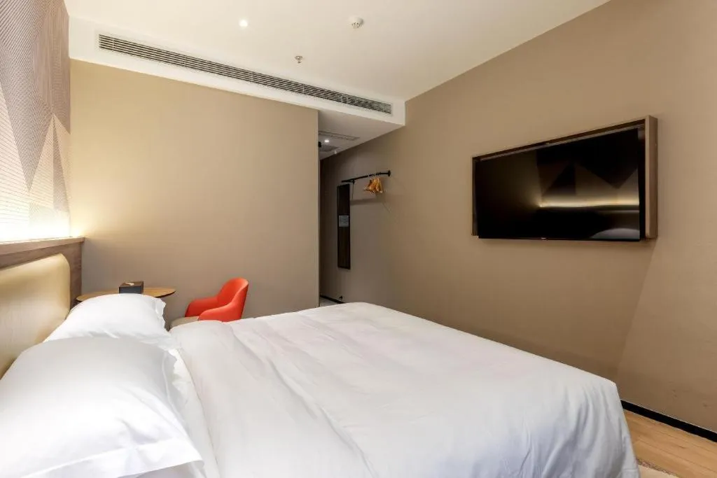 Bed in Borrman Hotel Korla Peacock River