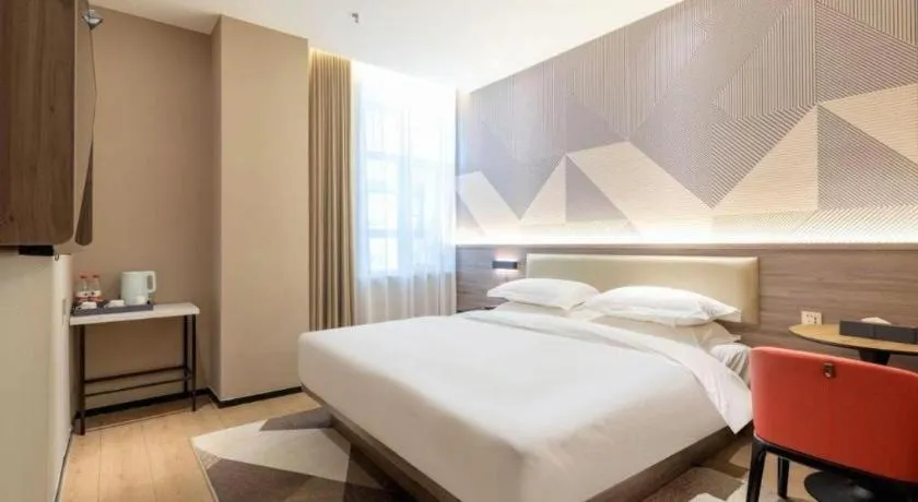 Bed in Borrman Hotel Korla Peacock River