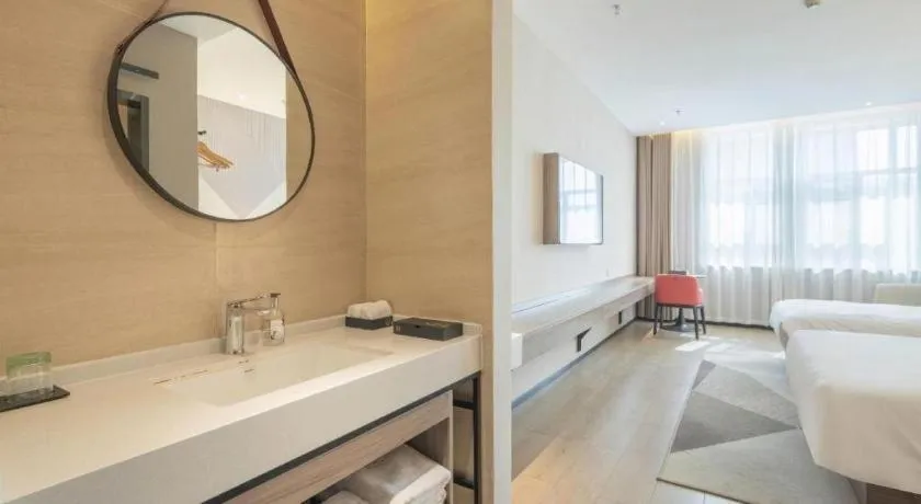 Bed in Borrman Hotel Korla Peacock River