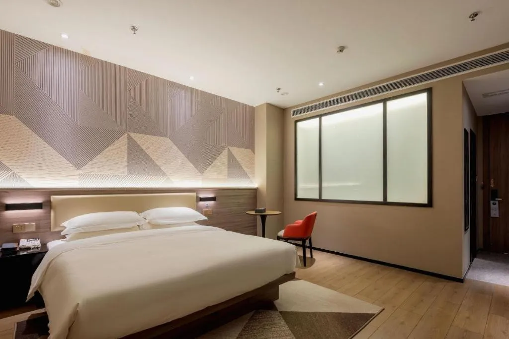 Bed in Borrman Hotel Korla Peacock River