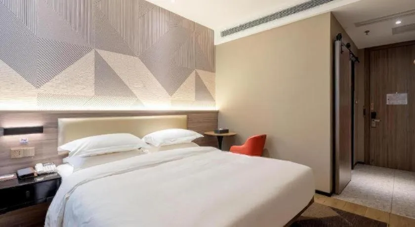 Bed in Borrman Hotel Korla Peacock River