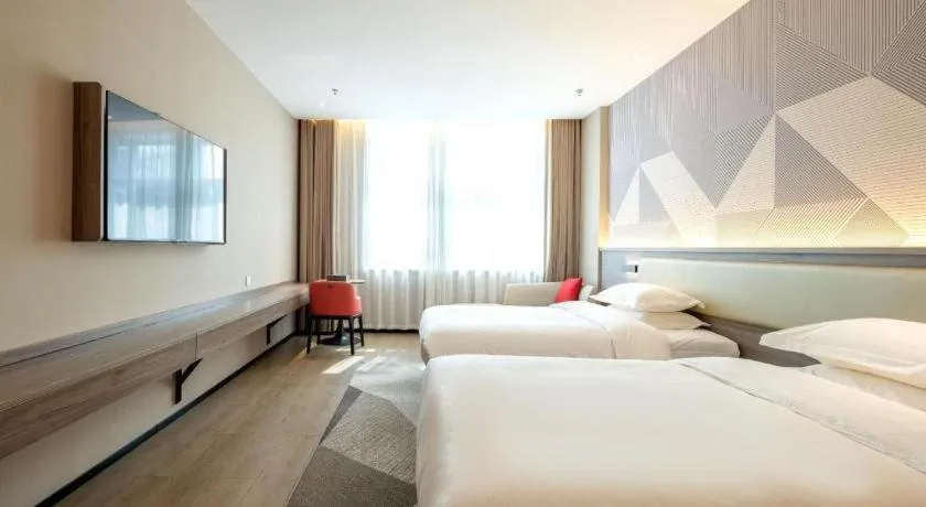 Bed in Borrman Hotel Korla Peacock River