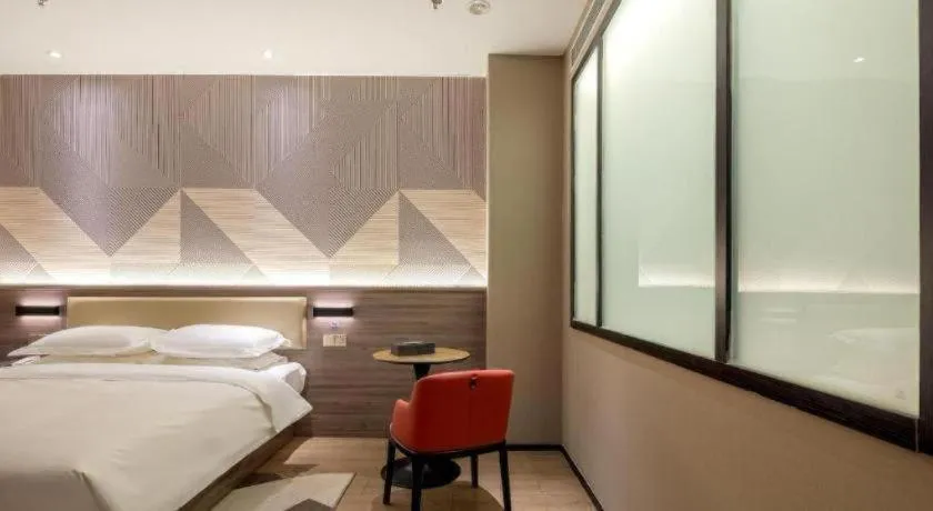 Bed in Borrman Hotel Korla Peacock River