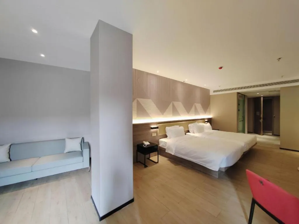 Bed in Borrman Hotel Korla Peacock River